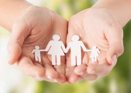 3 Ways to Build Family Relationships During Shelter-In-Place, Woman's hands holding paper man family